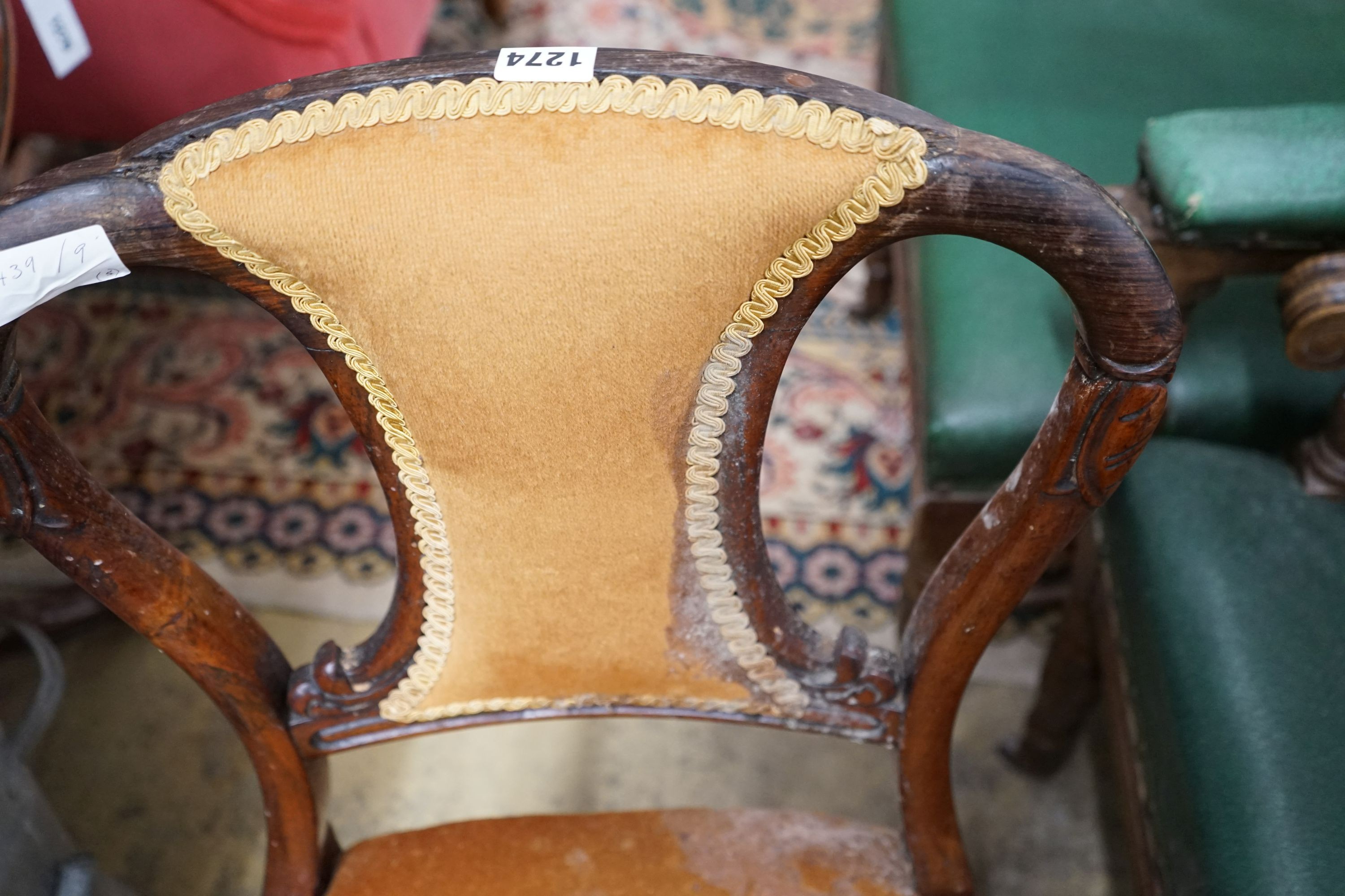 A set of five Victorian rosewood dining chairs